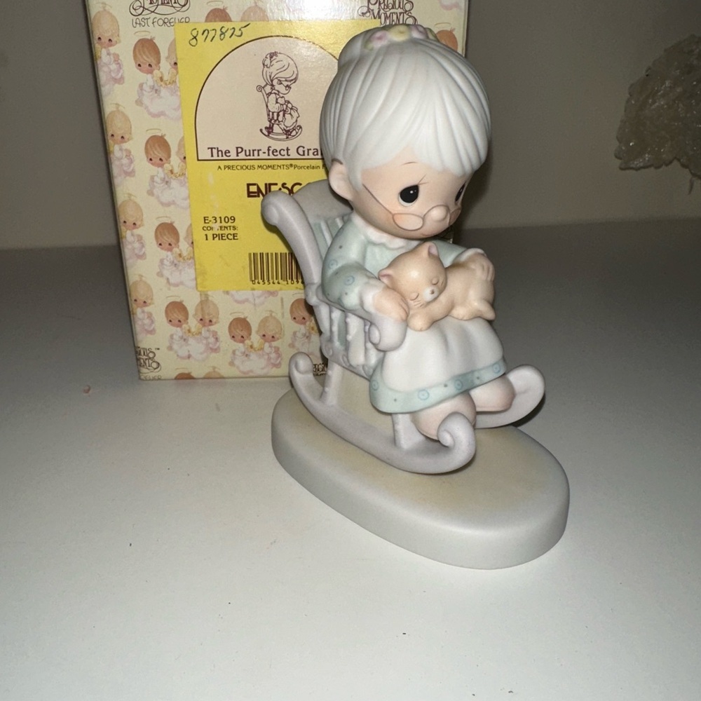 Precious Moments Gray and Cream Figurine